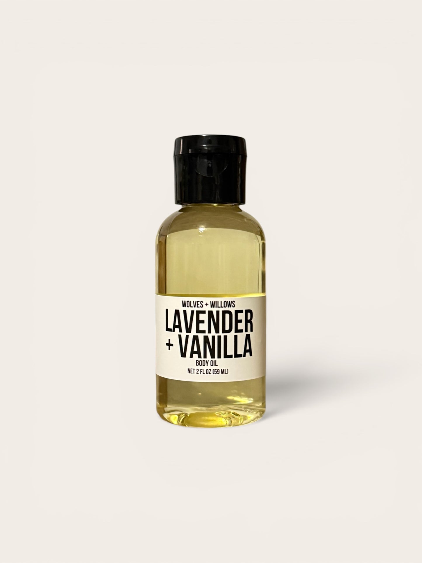 Bottle of lavender and vanilla scented oil on a white background