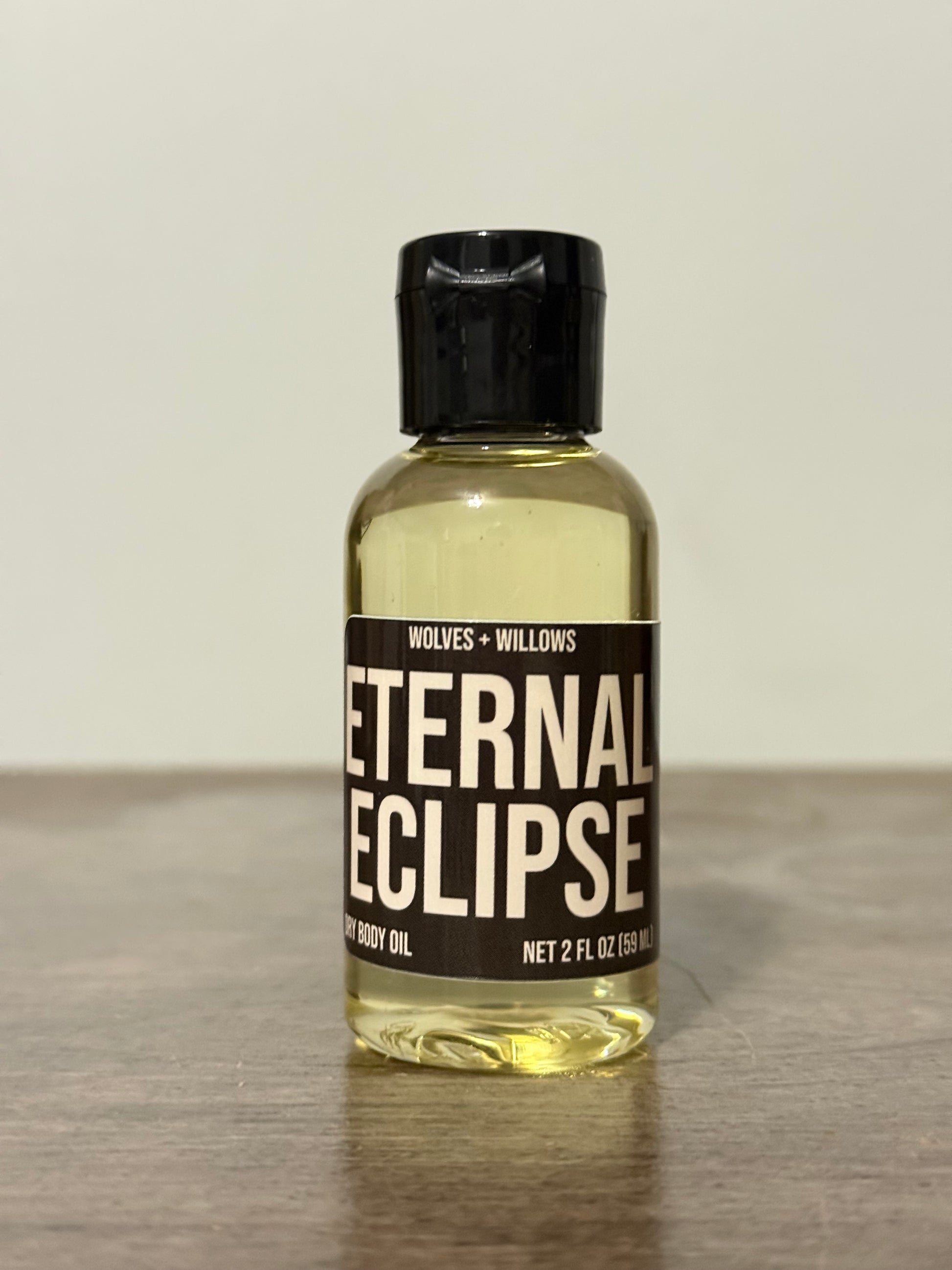 Bottle of 'Eternal Eclipse' on a neutral background