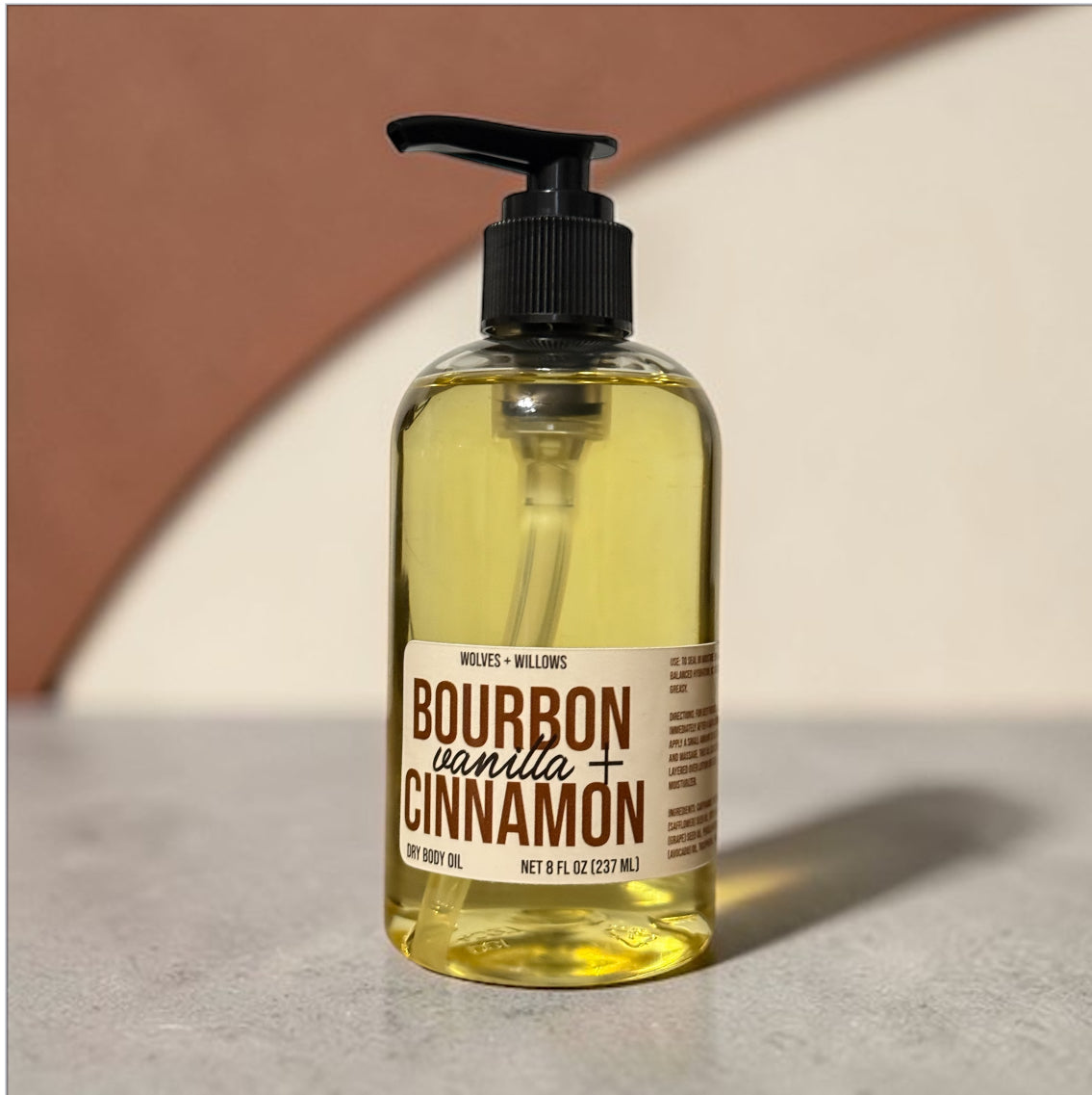 Bottle of Bourbon Vanilla Cinnamon soap on a neutral background
