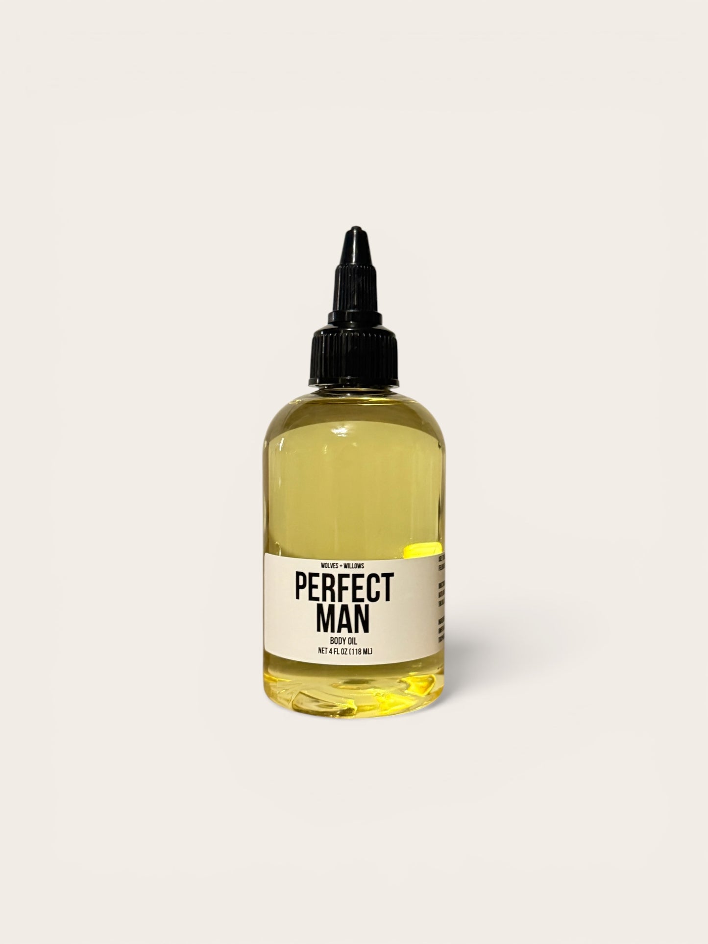 Bottle of 'Perfect Man' body oil on a white background