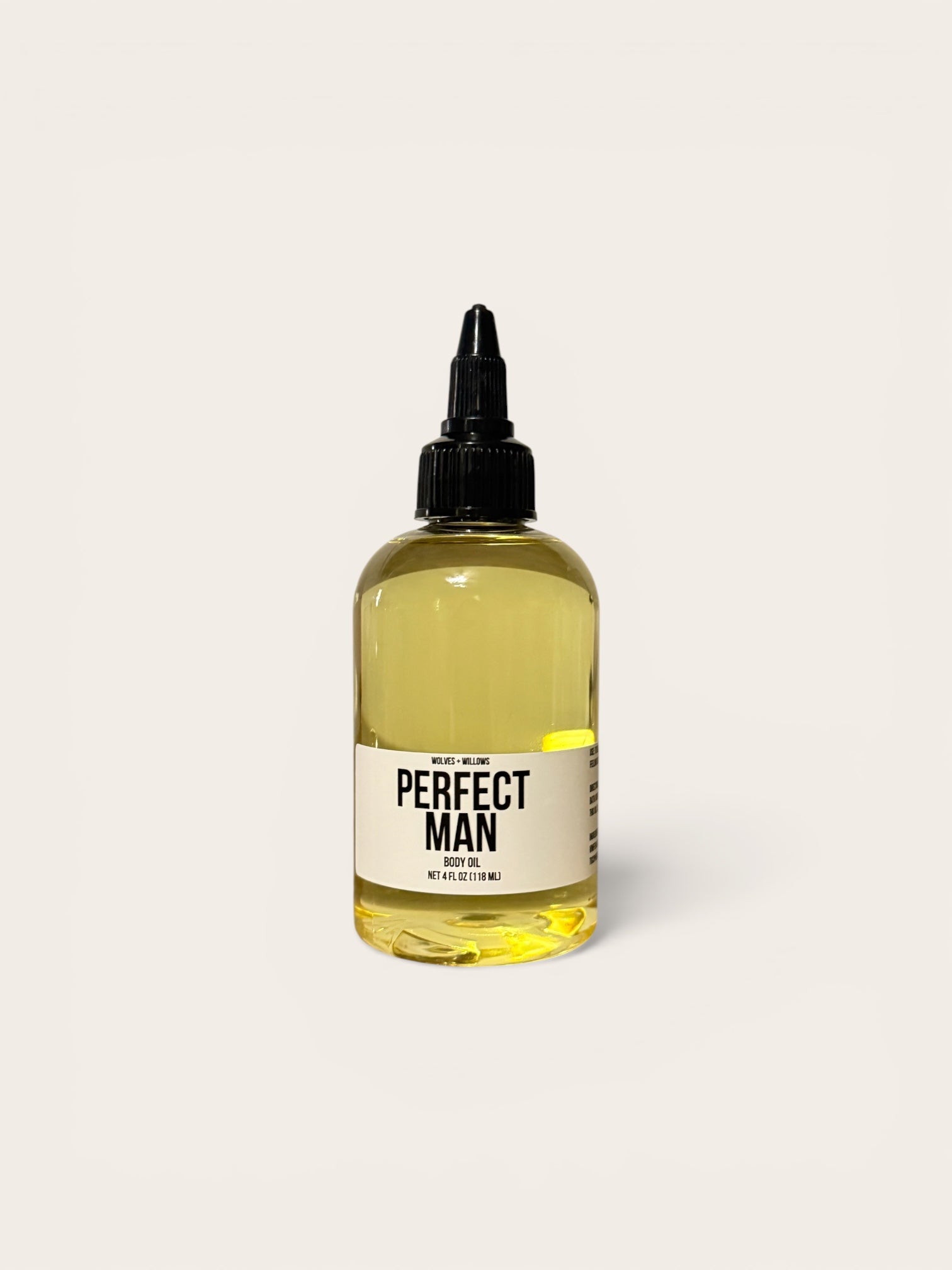 Bottle of 'Perfect Man' body oil on a white background