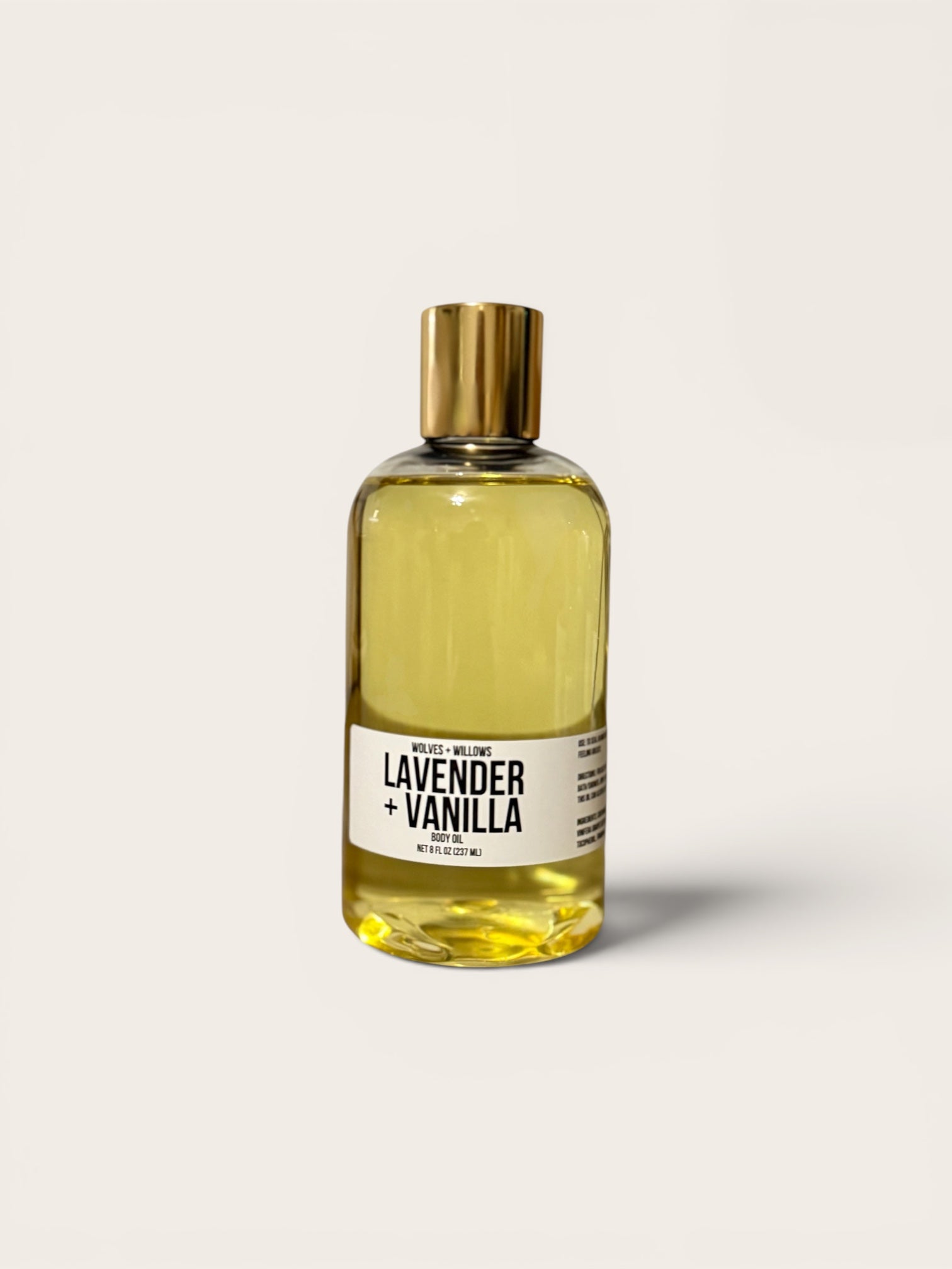 Bottle of lavender and vanilla essential oil on a white background