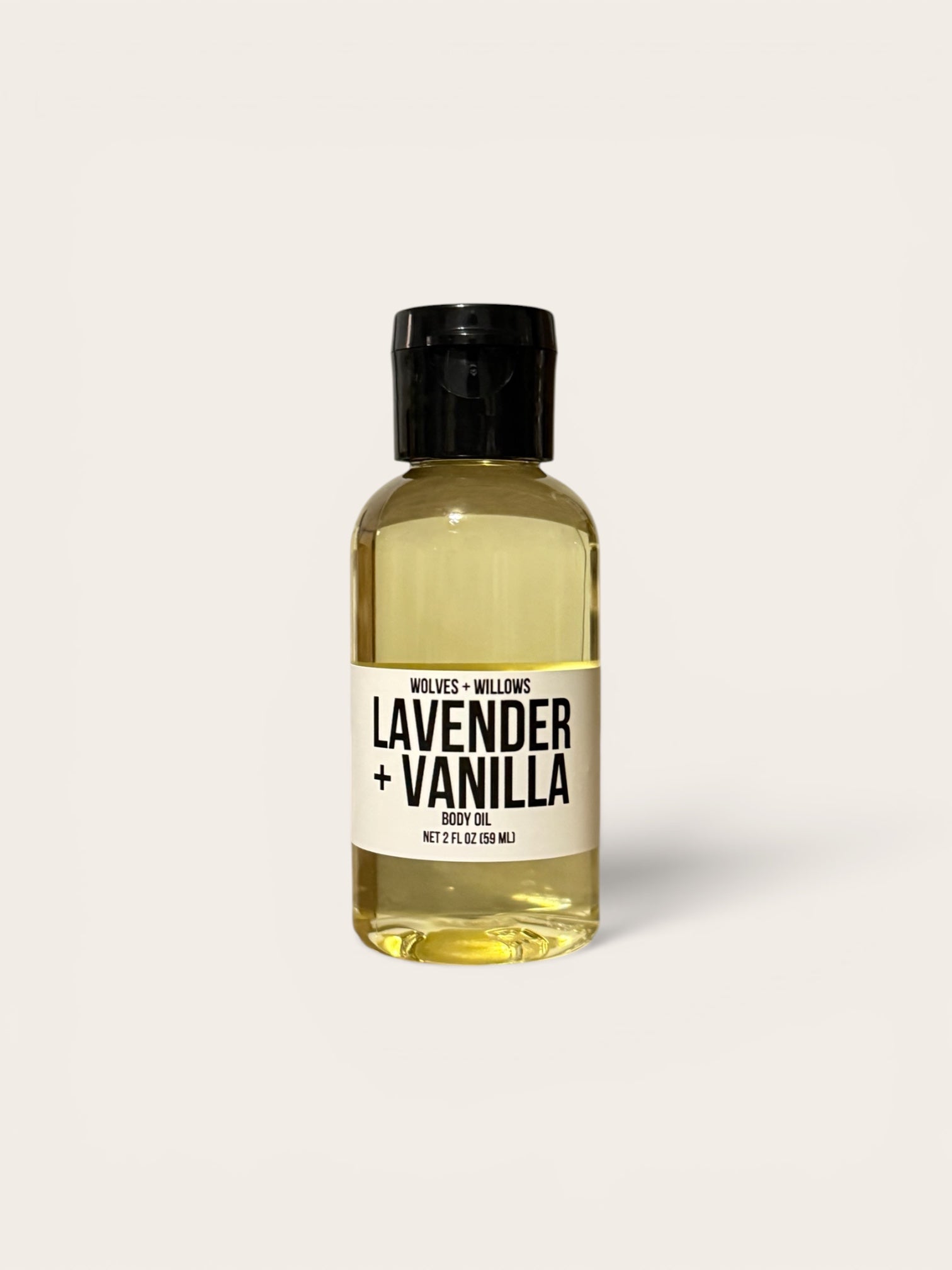 Bottle of lavender and vanilla scented oil on a white background