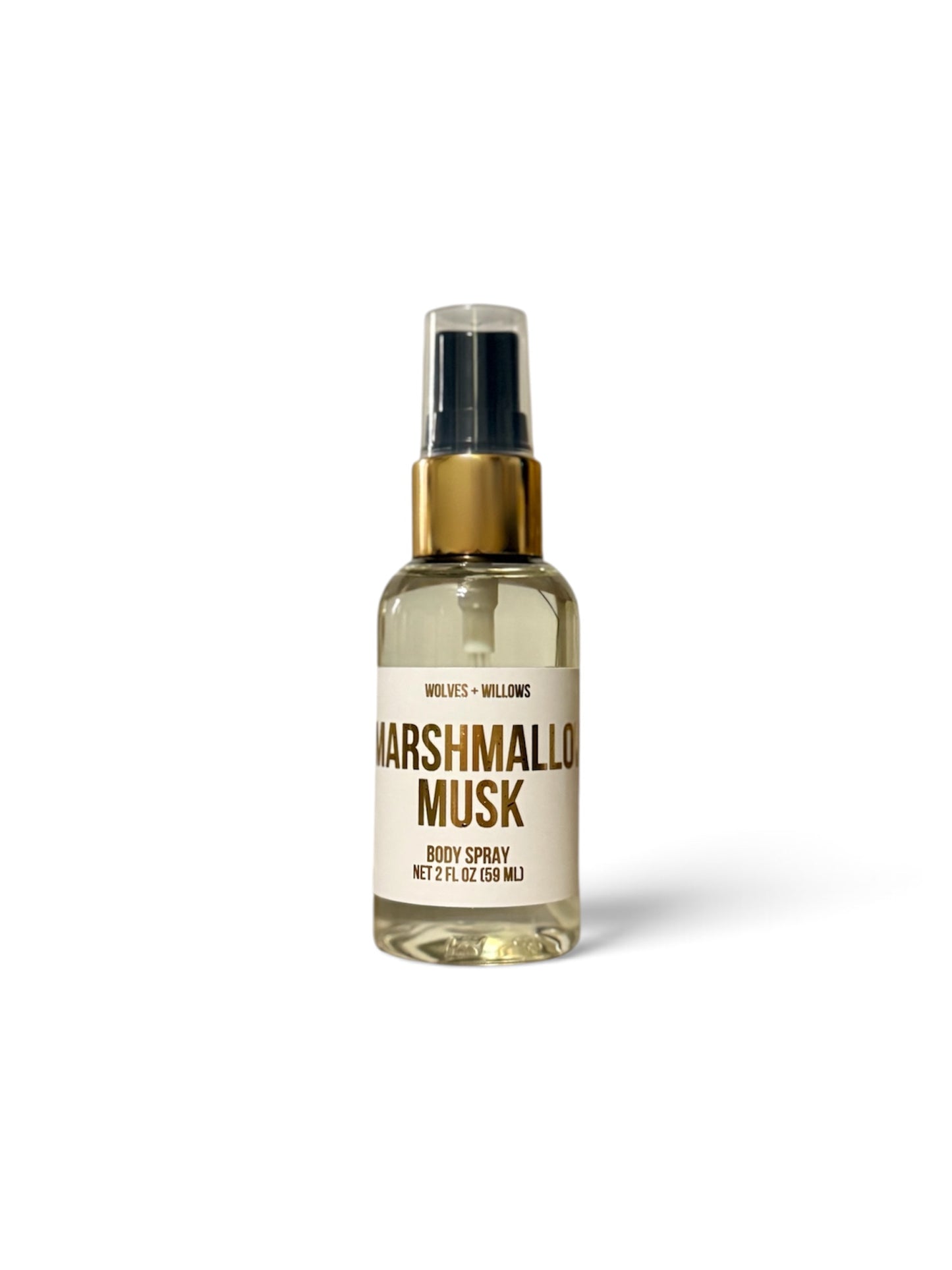 Marshmallo Musk body spray in a clear glass bottle with a gold spray collar and a cream-colored label, shown on a white background.