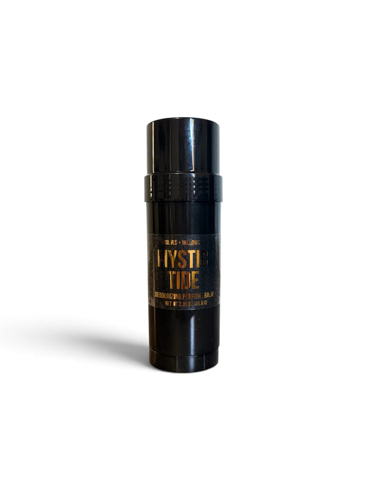A black cylindrical deodorant stick with gold lettering that reads 'MYSTIC TIDE' and 'DEODORANT STICK' on a clean white background.